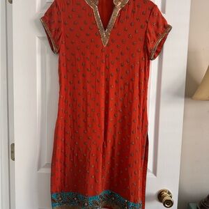Elegant Orange Kurta with Gold and Blue Accents